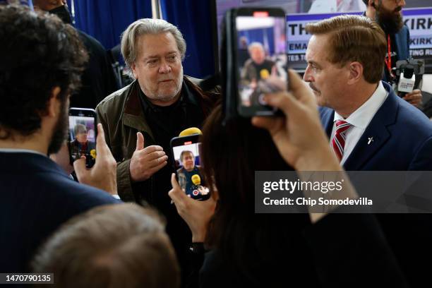 Steve Bannon , former advisor to former President Donald Trump and right-wing media executive, and businessman and election conspiracy theorist Mike...