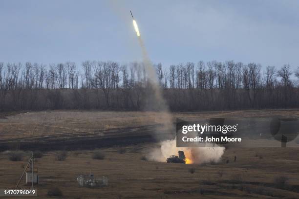 Ukrainian Army troops fire BM-21 "Grad" rockets at Russian positions on March 02, 2023 in the Donetsk Region of eastern Ukraine. Last February,...