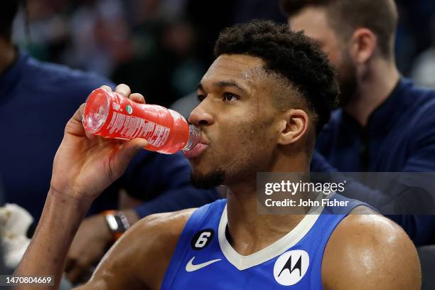 Giannis Antetokounmpo of the Milwaukee Bucks drinks Gatorade during a timeout during the second half of the game against the Orlando Magic at Fiserv...
