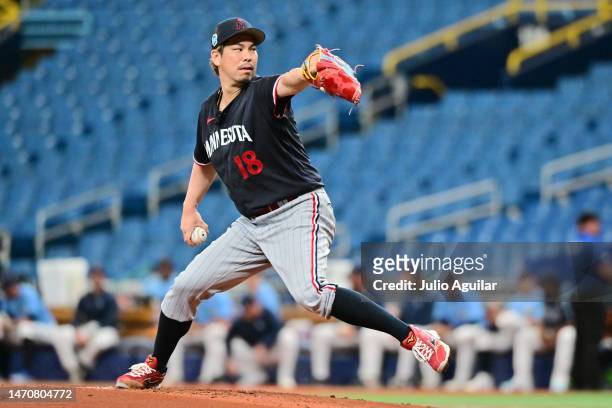 Kenta Maeda of the Minnesota Twins delivers a pitch to the Tampa Bay Rays in the first inning during a Grapefruit League Spring Training game at...