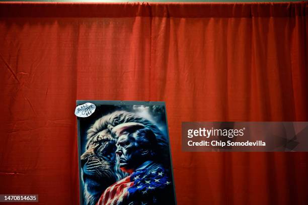 Many products with former President Donald Trump's name and image are for sale in the expo hall of the Conservative Political Action Conference at...
