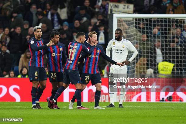 Barcelona players celebrate following the Copa Del Rey Semi Final Leg One match between Real Madrid CF and FC Barcelona at Estadio Santiago Bernabeu...