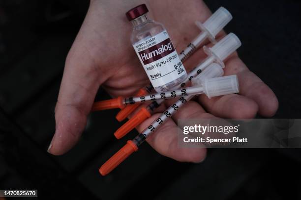 In this photo illustration, Taylor Jane Stimmler, whose had type 1 diabetes since a teenager, displays her insulin and needles used for injection, on...