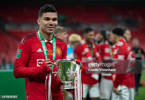 Casemiro of Manchester United celebrates with the trophy after the Carabao Cup Final match between Manchester United and Newcastle United at Wembley...