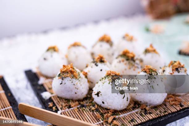 group of japanese rice ball, omusubi, onigiri, mixed rice - rice ball stockfoto's en -beelden