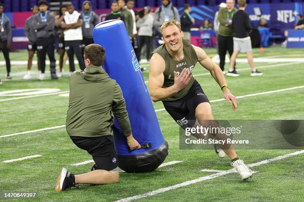 Linebacker Jack Campbell of Iowa participates in a drill during the NFL Combine at Lucas Oil Stadium on March 02, 2023 in Indianapolis, Indiana.