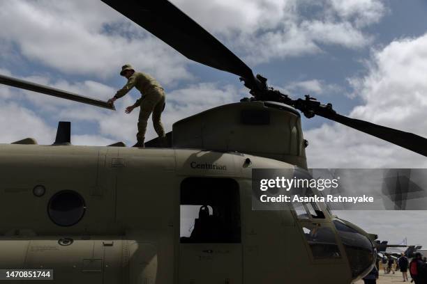 Member of the ADF inspects a Chinook helicopter on March 03, 2023 in Avalon, Australia. The 2023 Australian International Airshow & Aerospace and...