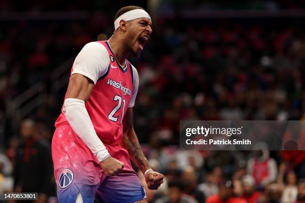 Daniel Gafford of the Washington Wizards celebrates after scoring a basket against the Toronto Raptors during the second half at Capital One Arena on...