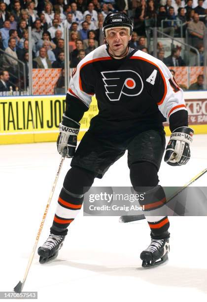 John LeClair of the Philadelphia Flyers skates against the Toronto Maple Leafs during NHL playoff game action on April 21, 2003 at Air Canada Centre...