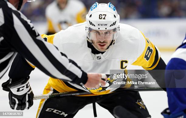 Sidney Crosby of the Pittsburgh Penguins faces off in the third period during a game against the Tampa Bay Lightning at Amalie Arena on March 02,...