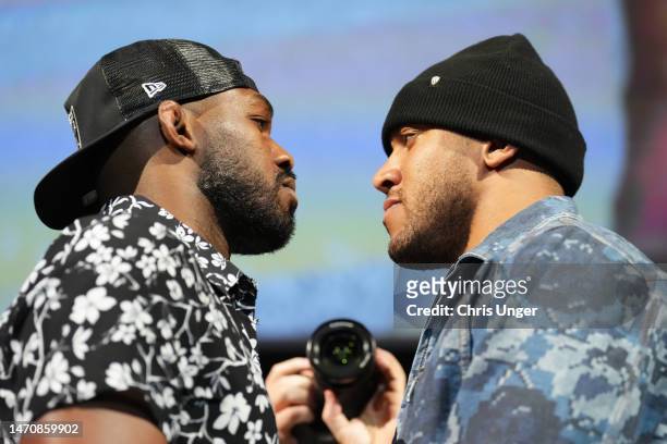 Jon Jones and Ciryl Gane of France face off during the UFC 285 Press Conference at the KA Theatre at MGM Grand Hotel & Casino on March 02, 2023 in...