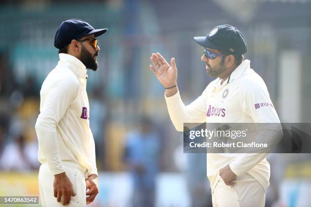 Virat Kohli and Rohit Sharma of India are seen during day three of the Third Test match in the series between India and Australia at Holkare Cricket...