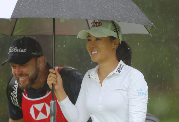 https://media.gettyimages.com/id/1470864655/photo/danielle-kang-of-the-united-states-and-her-caddie-shelter-from-the-rain-under-an-umbrella.jpg?s=612x612&w=0&k=20&c=oZI1i5vsV7nm0OsDpgPgsEeWe3Zynlm11xDX3dlzgSk=