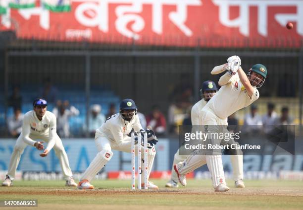 Travis Head of Australia bats during day three of the Third Test match in the series between India and Australia at Holkare Cricket Stadium on March...