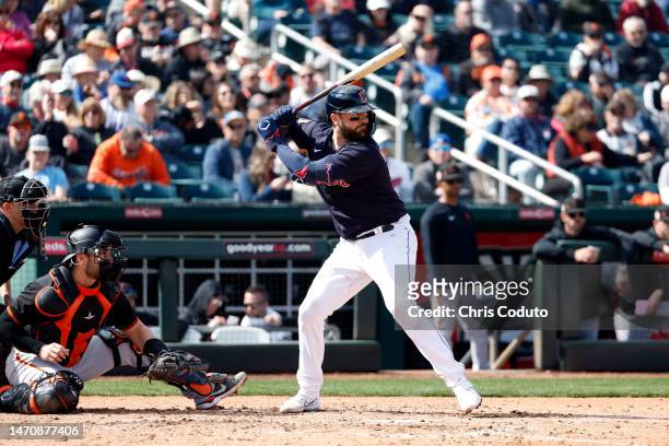 Cam Gallagher of the Cleveland Guardians bats during the fourth inning of a spring training game against the San Francisco Giants at Goodyear...