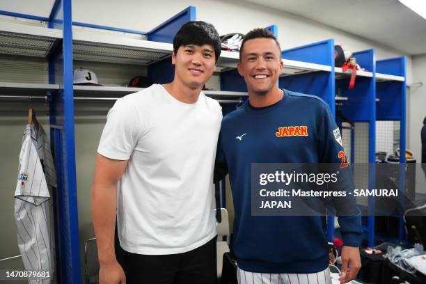 Pitcher Shohei Ohtani and Outfielder Lars Nootbaar of Samurai Japan pose in the locker room prior to the practice game between Samura Japan and...