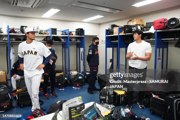 Pitcher Shohei Ohtani and Pitcher Yu Darvish of Samurai Japan talk in the locker room prior to the practice game between Samura Japan and Chunichi...