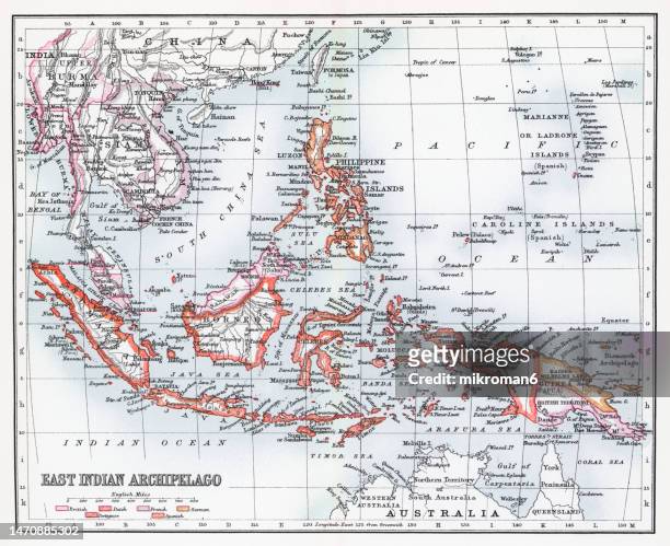 old chromolithograph map of east indian archipelago - island of borneo - fotografias e filmes do acervo