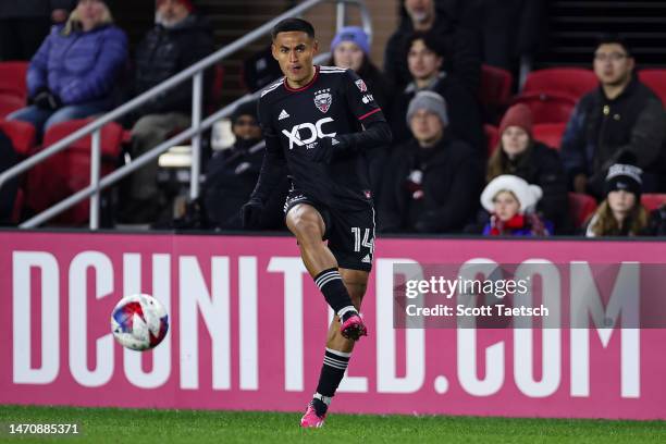 Andy Najar of DC United kicks the ball against Toronto FC during the first half of the MLS game at Audi Field on February 25, 2023 in Washington, DC.