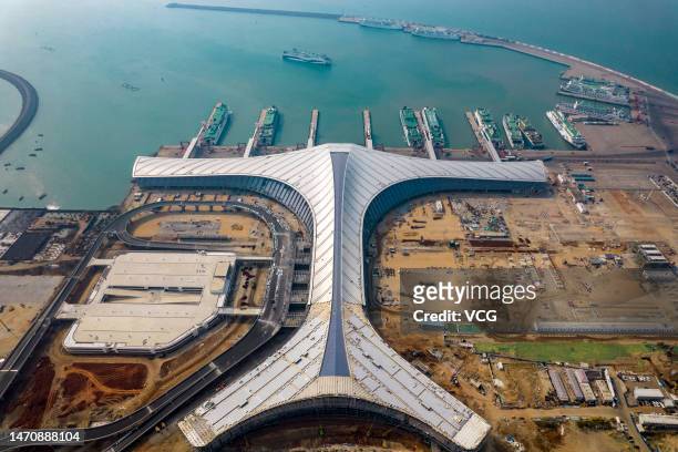 Aerial view of the construction site of a passenger transportation station at the Xinhai Port on March 2, 2023 in Haikou, Hainan Province of China.