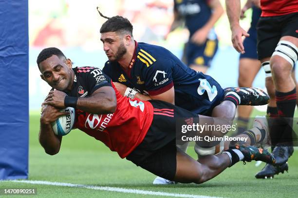 Sevu Reece of the Crusaders scores a try during the round two Super Rugby Pacific match between Crusaders and Highlanders at AAMI Park, on March 03...