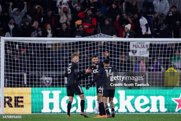 Jackson Hopkins, Victor Palsson, and Andy Najar of DC United celebrate after the MLS game against Toronto FC at Audi Field on February 25, 2023 in...