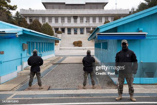 South Korean soldiers stand guard in the truce village of Panmunjom inside the demilitarized zone separating South and North Korea on March 03, 2023...