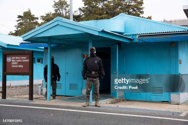 South Korean soldiers stand guard in the truce village of Panmunjom inside the demilitarized zone separating South and North Korea on March 03, 2023...