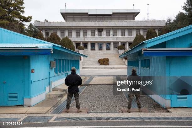 South Korean soldiers stand guard in the truce village of Panmunjom inside the demilitarized zone separating South and North Korea on March 03, 2023...