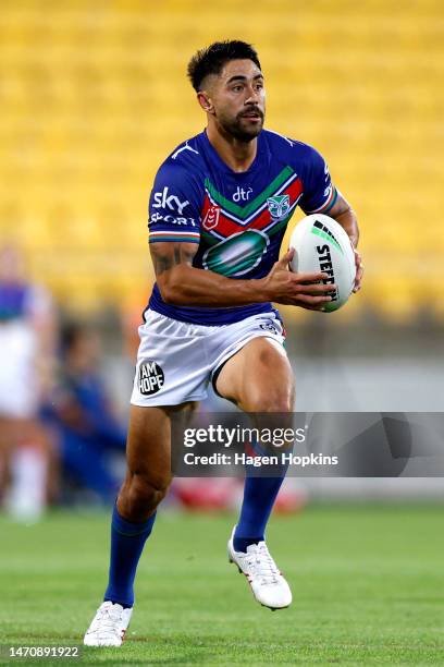 Shaun Johnson of the Warriors makes a break during the round one NRL match between the New Zealand Warriors and Newcastle Knights at Sky Stadium on...