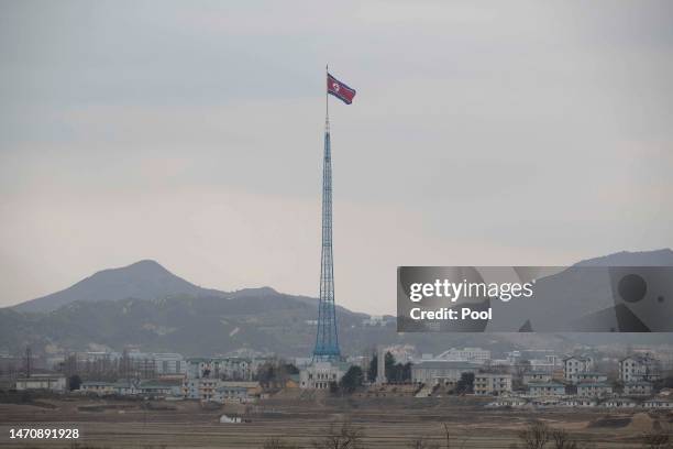 North Korean national flag in North Korea's propaganda village of Gijungdong is seen from a South Korea's observation post inside the demilitarized...