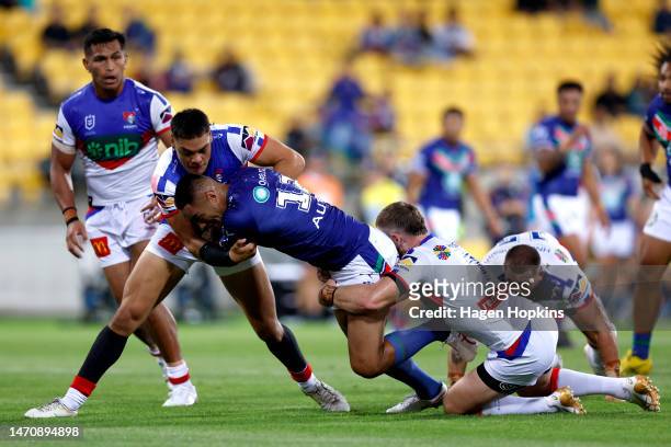 Marata Niukore of the Warriors charges forward during the round one NRL match between the New Zealand Warriors and Newcastle Knights at Sky Stadium...