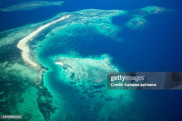 aerial shot of tropical island - southern pacific ocean stock pictures, royalty-free photos & images