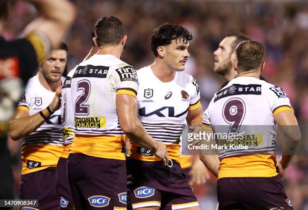 Herbie Farnworth of the Broncos celebrates with his team mates after scoring a try during the round NRL match between the Penrith Panthers and the...