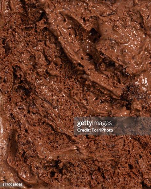 full frame texture background of melted chocolate ice cream - chocolate chip ice cream stock pictures, royalty-free photos & images