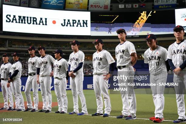 Samurai Japan players line up prior to the practice game between Samura Japan and Chunichi Dragons at Vantelin Dome Nagoya on March 3, 2023 in...