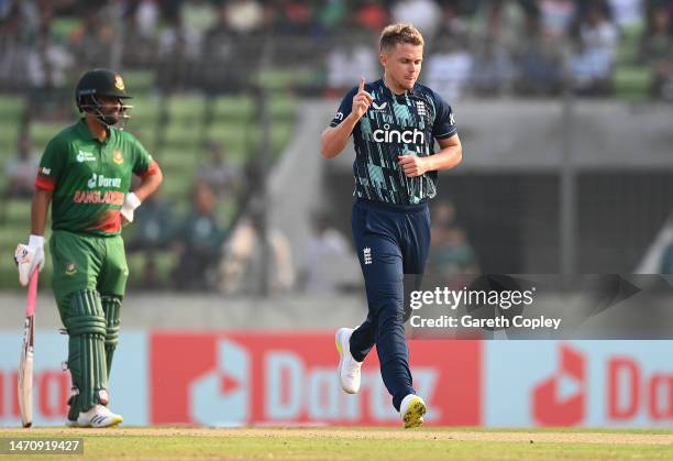 Sam Curran of England celebrates taking the wicket of Litton Das of Bangladesh during the 2nd One Day International match between Bangladesh and...