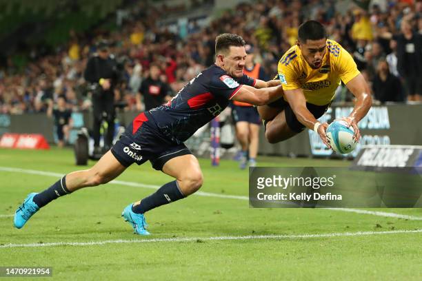 Salesi Rayasi of the Hurricanes scores a try during the round two Super Rugby Pacific match between Melbourne Rebels and Hurricanes at AAMI Park, on...