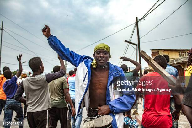 Congolese youths march during the "Ville morte" operation organised by pressure groups and citizen movements in Goma , 6 February 2023. The Congolese...
