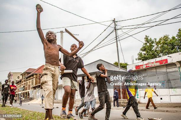 Congolese youths march during the "Ville morte" operation organised by pressure groups and citizen movements in Goma , 6 February 2023. The Congolese...