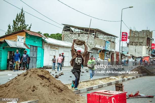 Congolese youths march during the "Ville morte" operation organised by pressure groups and citizen movements in Goma , 6 February 2023. The Congolese...