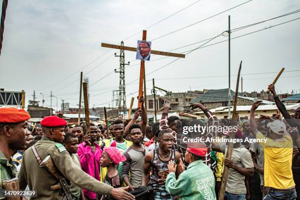 Congolese youths march during the "Ville morte" operation organised by pressure groups and citizen movements in Goma , 6 February 2023. The Congolese...