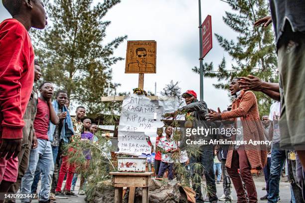 Congolese youths simulating the funeral of Rwandan President Paul Kagame during the "Dead City" organised by pressure groups and citizen movements in...