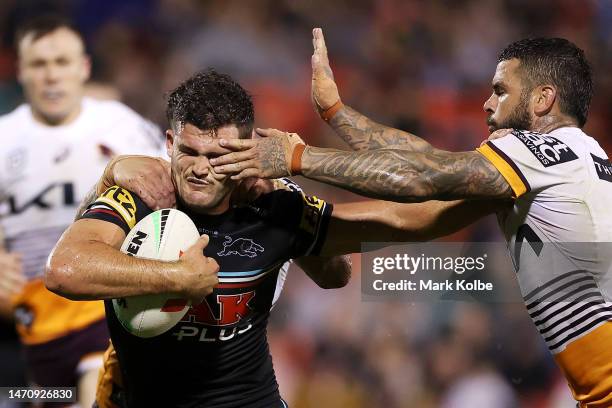 Nathan Cleary of the Panthers is tackled during the round NRL match between the Penrith Panthers and the Brisbane Broncos at BlueBet Stadium on March...