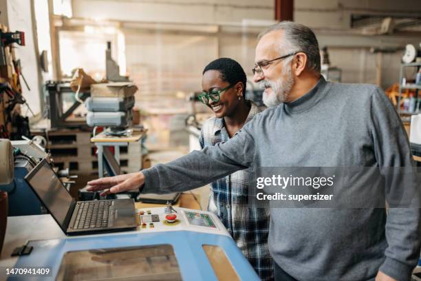 we love working together - laser engraving stock pictures, royalty-free photos & images