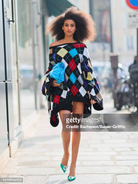 Imaan Hammam is seen heading to 'The Loewe' fashion show during Paris Fashion Week on March 03, 2023 in Paris, France.