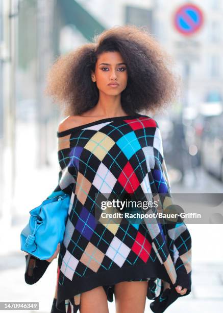 Imaan Hammam is seen heading to 'The Loewe' fashion show during Paris Fashion Week on March 03, 2023 in Paris, France.