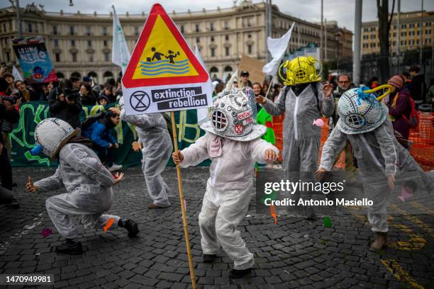 Climate activists take part in a demonstration organized by Friday For Future movement as part of the Global Climate Strike, on March 3, 2022 in...