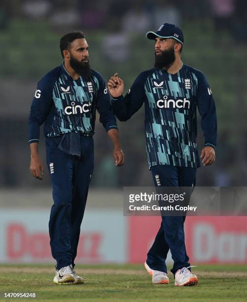 Adil Rashid of England celebrates with Moeen Ali after dismissing Mehidy Hasan Miraz of Bangladesh during the 2nd One Day International between...