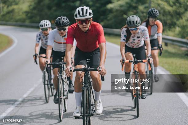 asian chinese cycling team practicing during weekend morning in rural scene - race leader athlete stock pictures, royalty-free photos & images